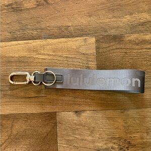 lululemon athletica Gray Logo Wrist Key Strap with Silver Hardware